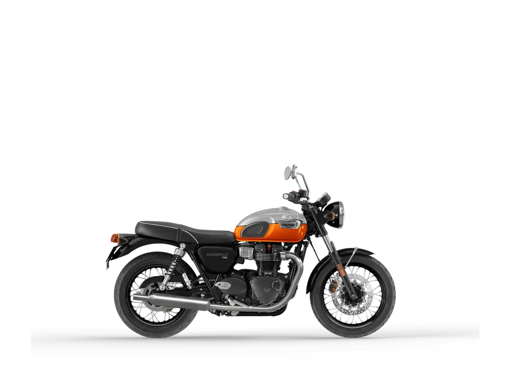 Triumph BONNEVILLE T100 2021 in Aluminum / Baja Orange, right side studio photograph
