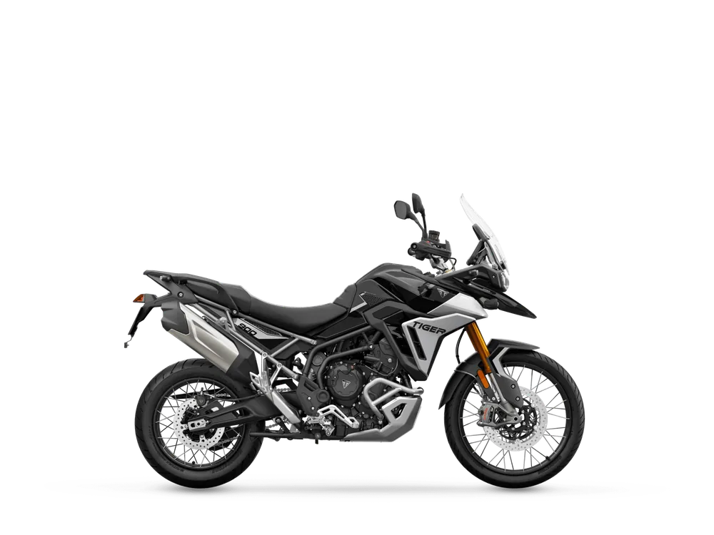 Triumph TIGER 900 RALLY PRO 2024 in Carbon Black / Sapphire Black, right side studio photograph