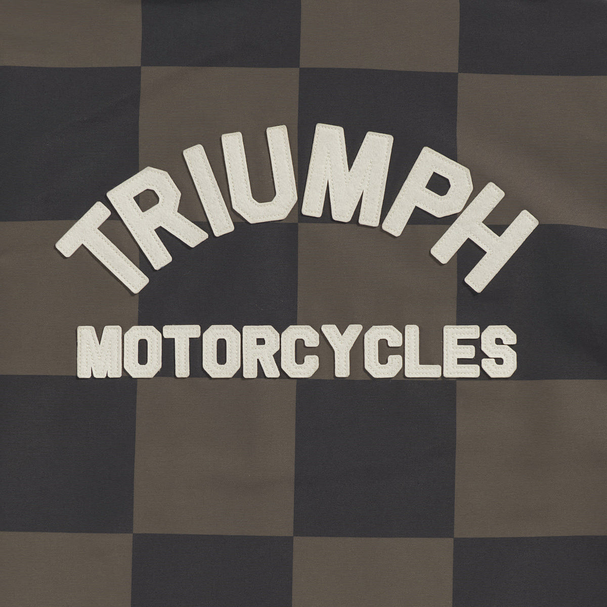 Triumph Carter Checkerboard Jacket, close-up of the arched Triumph Motorcycles back graphic