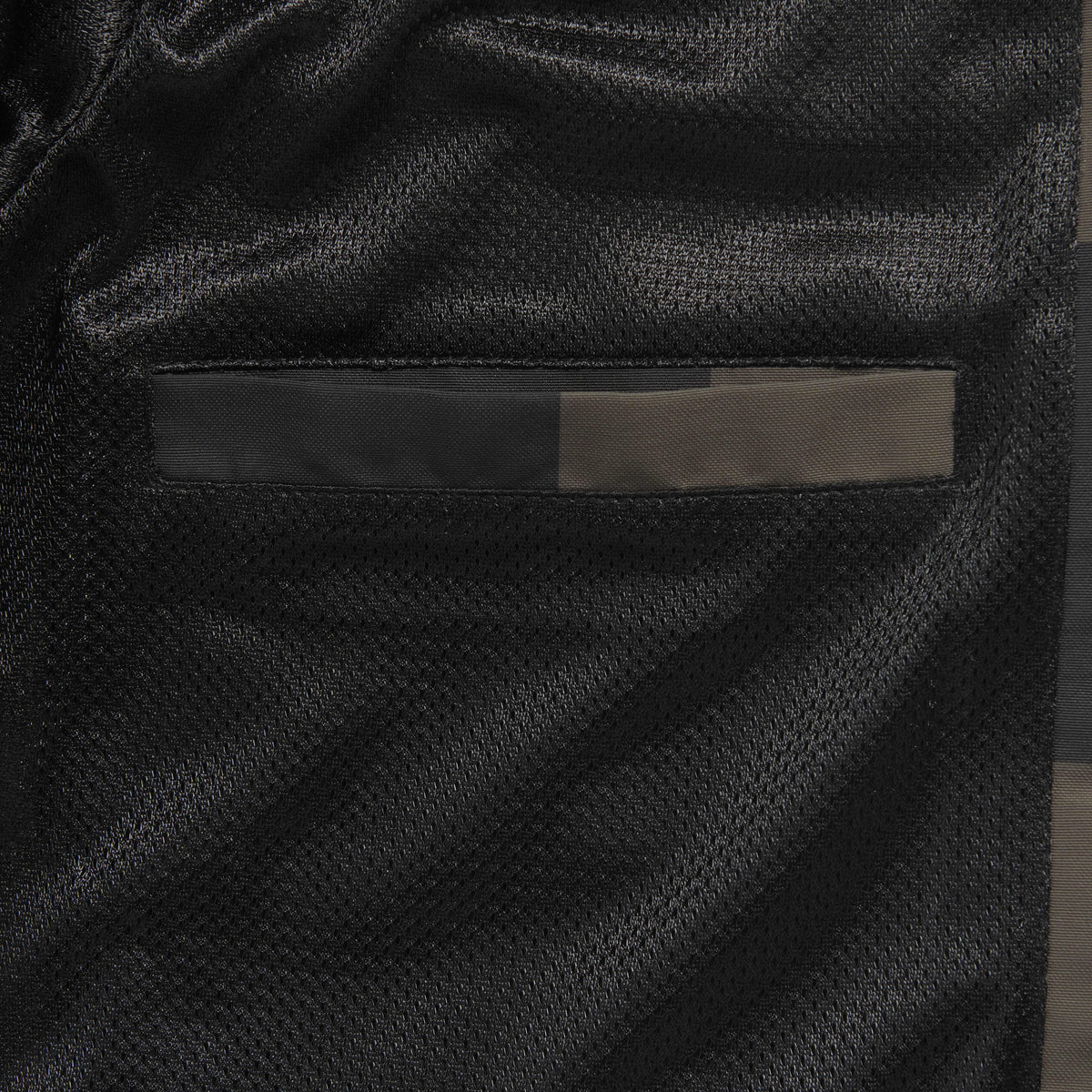 Triumph Carter Checkerboard Jacket, interior mesh lining and inner pocket